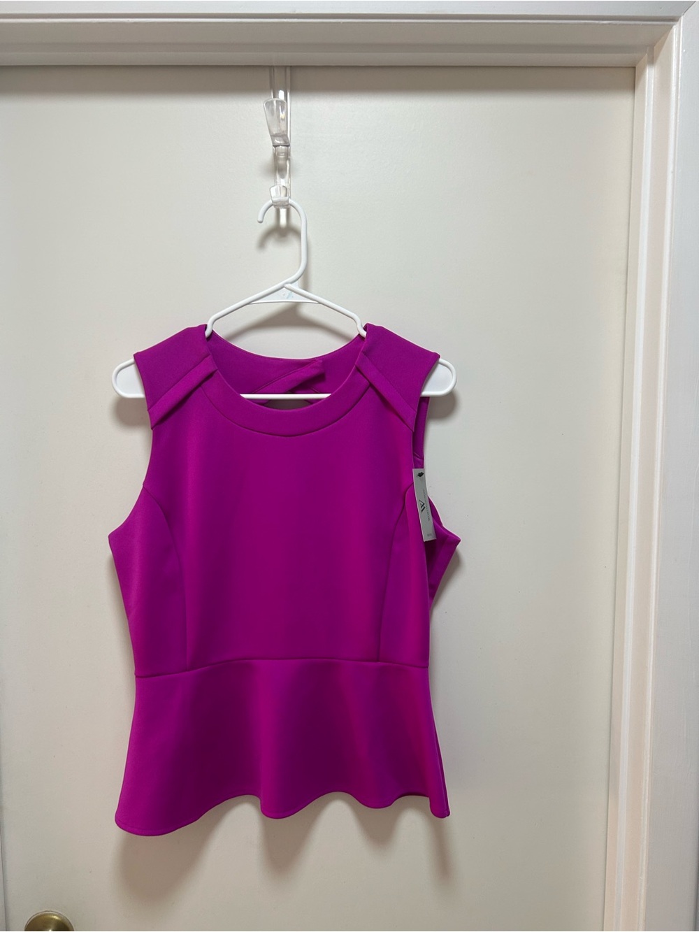 Sleeveless Peplum Top in Vibrant Magenta